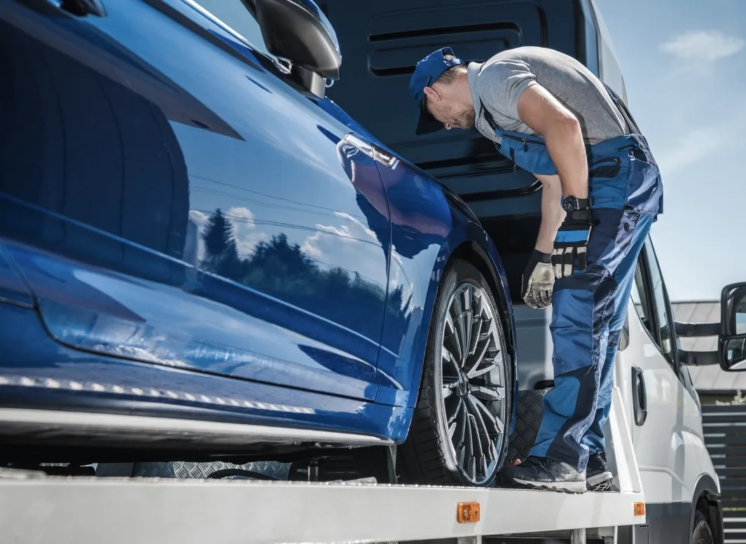 Regina local tow truck loading vehicle